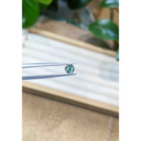 0.76 Ct. Bluish Green Sapphire from Madagascar Life Style