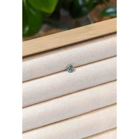 0.67 Ct. Greenish Blue Sapphire from Madagascar Life Style