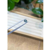 0.67 Ct. Greenish Blue Sapphire from Madagascar Life Style