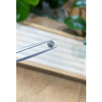 0.56 Ct. Greyish Blue Sapphire from Madagascar Life Style