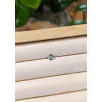 0.56 Ct. Greyish Blue Sapphire from Madagascar Life Style