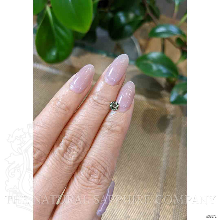 0.47 Ct. Yellowish Green Sapphire from Madagascar