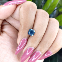 1.54 Ct. Greenish Blue Sapphire from Madagascar Life Style