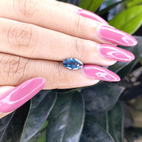 1.25 Ct. Greenish Blue Sapphire from Madagascar Life Style