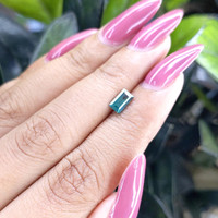 0.78 Ct. Bluish Green Sapphire from Madagascar Life Style