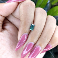 0.78 Ct. Bluish Green Sapphire from Madagascar Life Style