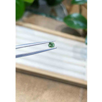 0.43 Ct. Bluish Green Sapphire from Madagascar Life Style