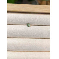 0.43 Ct. Bluish Green Sapphire from Madagascar Life Style