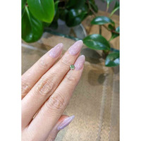 0.43 Ct. Bluish Green Sapphire from Madagascar Life Style