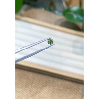 0.50 Ct. Green Sapphire from Madagascar Life Style