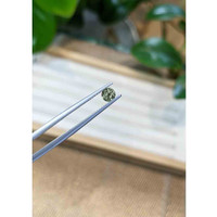 0.51 Ct. Green Sapphire from Madagascar Life Style