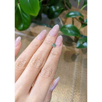 0.56 Ct. Green Sapphire from Madagascar Life Style