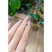 0.54 Ct. Greenish Blue Sapphire from Madagascar Life Style