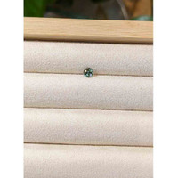 0.54 Ct. Greenish Blue Sapphire from Madagascar Life Style