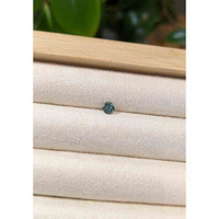 0.63 Ct. Greenish Blue Sapphire from Madagascar Life Style