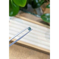 0.42 Ct. Bluish Green Sapphire from Madagascar Life Style