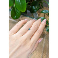 0.42 Ct. Bluish Green Sapphire from Madagascar Life Style