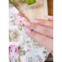 0.45 Ct. Blue Sapphire from Madagascar Life Style