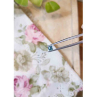 0.56 Ct. Bluish Green Sapphire from Madagascar Life Style