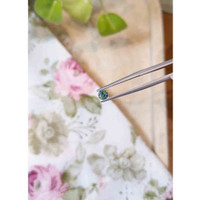 0.51 Ct. Bluish Green Sapphire from Madagascar Life Style