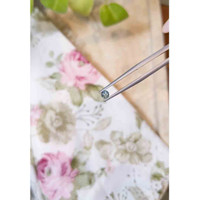 0.33 Ct. Greenish Blue Sapphire from Madagascar Life Style