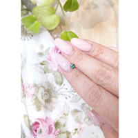 0.46 Ct. Bluish Green Sapphire from Madagascar Life Style