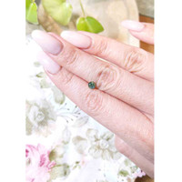 0.62 Ct. Bluish Green Sapphire from Madagascar Life Style