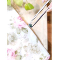 0.62 Ct. Bluish Green Sapphire from Madagascar Life Style