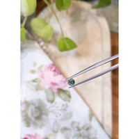 0.50 Ct. Bluish Green Sapphire from Madagascar Life Style