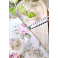 0.52 Ct. Bluish Green Sapphire from Madagascar Life Style