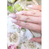 0.47 Ct. Bluish Green Sapphire from Madagascar Life Style