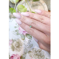 0.37 Ct. Bluish Green Sapphire from Madagascar Life Style