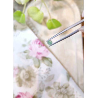 0.37 Ct. Bluish Green Sapphire from Madagascar Life Style