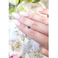 0.54 Ct. Greenish Blue Sapphire from Madagascar Life Style