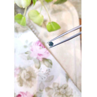 0.54 Ct. Greenish Blue Sapphire from Madagascar Life Style