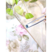 0.47 Ct. Greenish Blue Sapphire from Madagascar Life Style