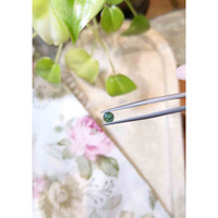 0.59 Ct. Bluish Green Sapphire from Madagascar Life Style