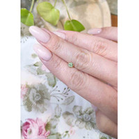 0.47 Ct. Yellowish Green Sapphire from Madagascar Life Style