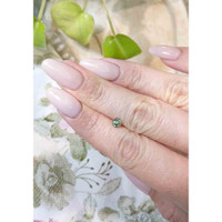 0.42 Ct. Bluish Green Sapphire from Madagascar Life Style