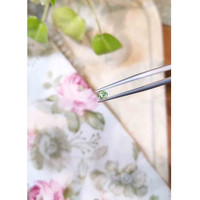 0.35 Ct. Yellowish Green Sapphire from Madagascar Life Style