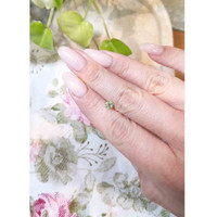 0.62 Ct. Greenish Yellow Sapphire from Madagascar Life Style