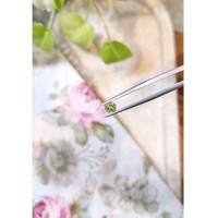 0.62 Ct. Greenish Yellow Sapphire from Madagascar Life Style