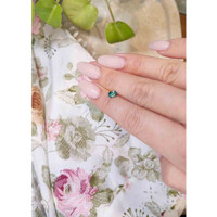 0.69 Ct. Greenish Blue Sapphire from Madagascar Life Style