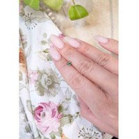 0.72 Ct. Green Sapphire from Madagascar Life Style