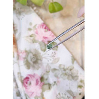 0.57 Ct. Bluish Green Sapphire from Madagascar Life Style