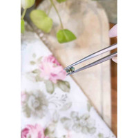 0.63 Ct. Bluish Green Sapphire from Madagascar Life Style