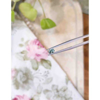 0.39 Ct. Greenish Blue Sapphire from Madagascar Life Style