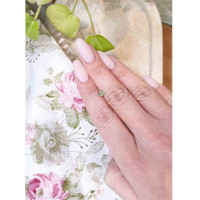 0.60 Ct. Yellowish Green Sapphire from Madagascar Life Style