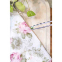 0.60 Ct. Yellowish Green Sapphire from Madagascar Life Style