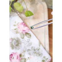 0.56 Ct. Yellowish Green Sapphire from Madagascar Life Style